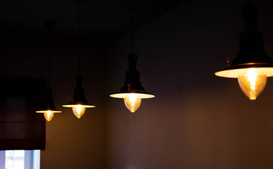 Lighting for a nice cozy cafe. Dim light in the room. Romantic light in the room.