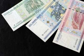 Outdated Belarusian rubles on a dark background close up