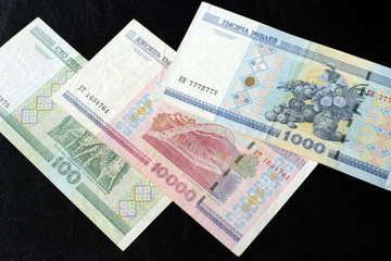 Outdated Belarusian rubles on a dark background close up