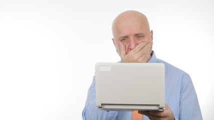 Disappointed Businessman Image Reading Bad Financial News on Laptop