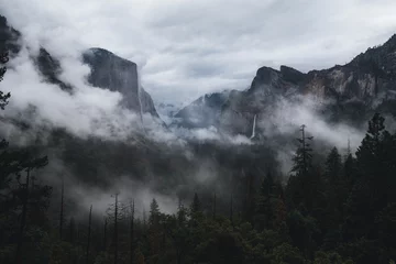 Fotobehang Moody clouds in the valley of Yosemite © Pauline