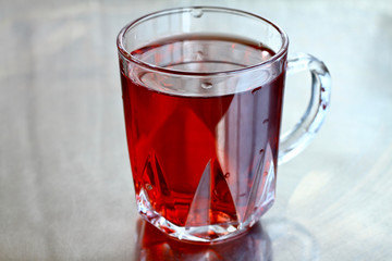 Cup of black tea isolated on white background