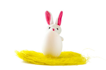 Easter scene with colored eggs, easter bunny,, white background