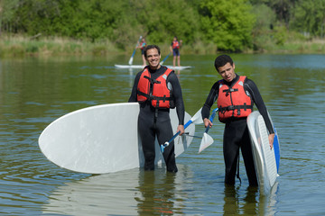 men after surf paddle session