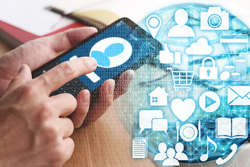 Big data acquisition concept. Closeup of male hands pushing button to sign in. Global network and apps icons.