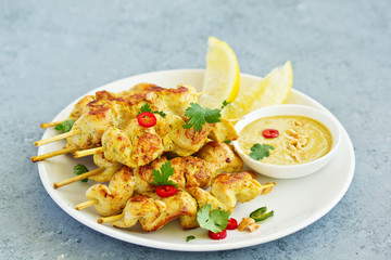 Chicken breast with curry with peanut sauce.