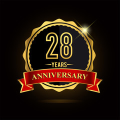 Celebrating 28 years anniversary logo. with golden ring and red ribbon.