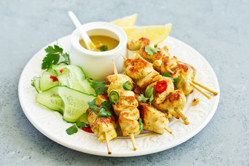 Chicken breast with curry with peanut sauce.