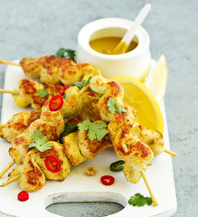 Chicken breast with curry with peanut sauce.