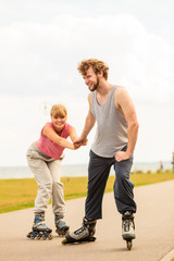 roller skater couple skating outdoor