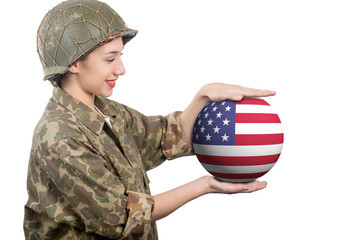 pretty young woman in ww2 uniform us showing sphere of American flag