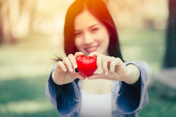 cute teen girl giving heart love concept vintage color tone