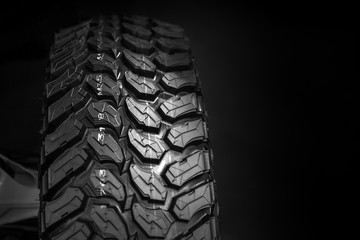 closeup new track off road tyre ATV mud tire with space for advertising background.