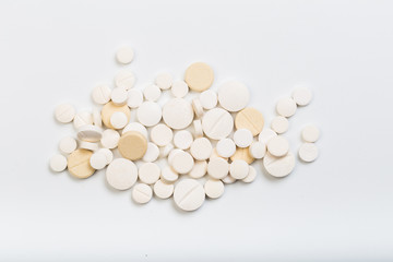 set of white tablets  on a white background