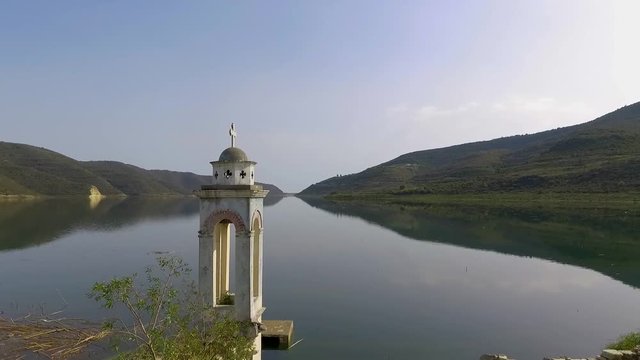 Abandoned old church immersed under reservoir water in Cyprus