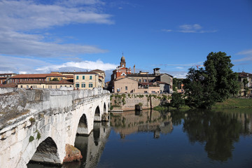 Rimini old town and tiberius bridge cityscape Italy