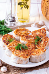 Fried lavash rolls with potatoes and mushrooms