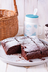 Homemade chocolate cake with icing sugar