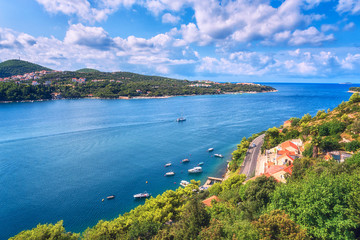 Obraz premium Dubrovnik harbor, panoramic view from viewpoint on the Adriatic highway E65 (Jadranska magistrala) near Franjo Tudjman bridge. Scenic daytime landscape, travel background