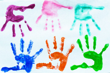 colorful hand prints of human hands isolated on white background