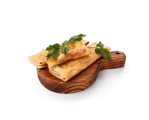 Wooden board with tasty fried spring rolls on white background
