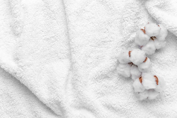 Cotton flowers on soft towel