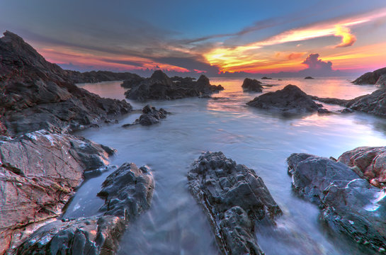 Beautiful sunrise at Pandak Beach, Malaysia in black and white image