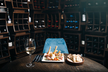 Vine with snacks at the bar