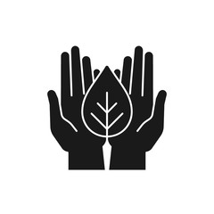 Black isolated icon of plant in hands on white background. Silhouette of leaf and hands. Symbol of care, protection, charity.