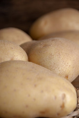 Close-up of potatoes in vertical. With unfocused background