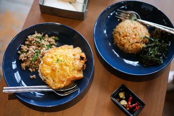 Thai Food Rice topped with Fried pork sweet basil.