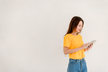 Beautiful business women playing digital tablets, resting and shopping online