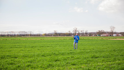 Boy flying a kite in the field