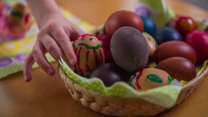 Fototapeta na wymiar Homemade Easter eggs in basket
