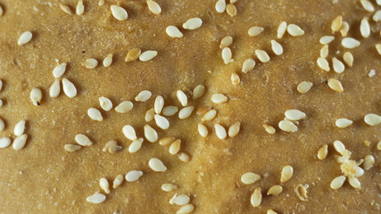 Bun dusted with sesame rotates around its axis, background video