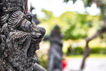 Hinduism balinese sculpture made out of stone
