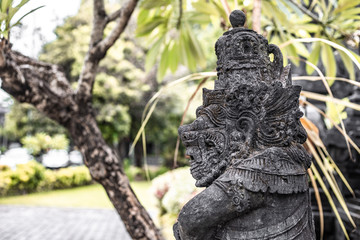 Hinduism balinese sculpture made out of stone