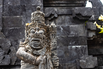 Hinduism balinese sculpture made out of stone