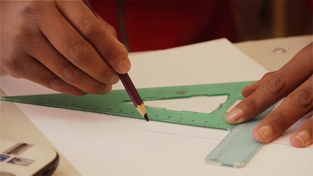 Precision and Focus, Student Measuring in Math Class, Close Up