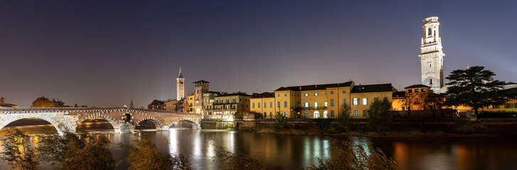 Fototapeta na wymiar Ponte Pietra and Adige River at night - Verona Italy