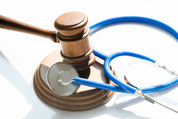 Gavel and stethoscope. Medical laws and legal concept.