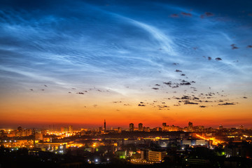 Noctilucent clouds over Yekaterinburg city downtown at summer night