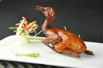 grilled chicken with vegetables on white plate