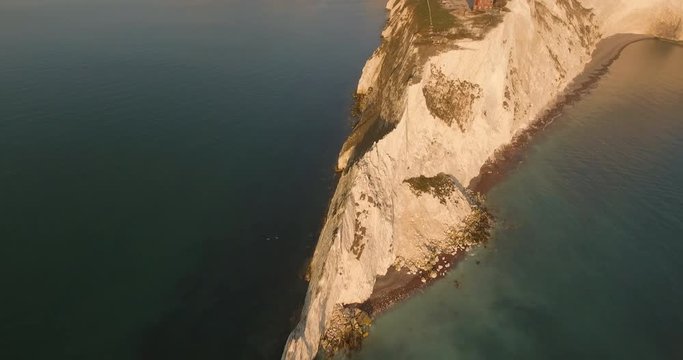 4k Aerial footage of the Needles on the isle of wight in the solent during early sunset and golden hour.