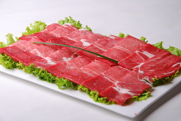 slices of ham on a plate