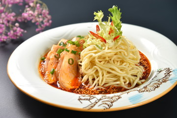 spaghetti with tomato sauce and basil