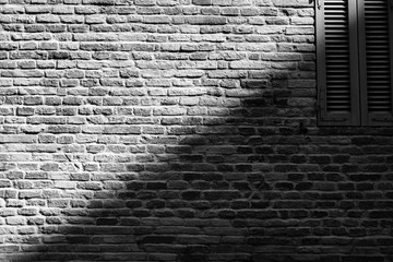 old wall with diagonal shadow