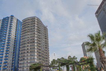 Fototapeta na wymiar Modern european complex of apartment buildings. Common modern apartment skyscrapers