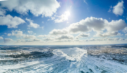 Asbest, Russia - May, 2018: Aerial panoramic shot of asbestos mining quarry at winter