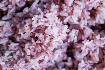 Close Up Riceberry Rice on wood Background, Product of thailand.